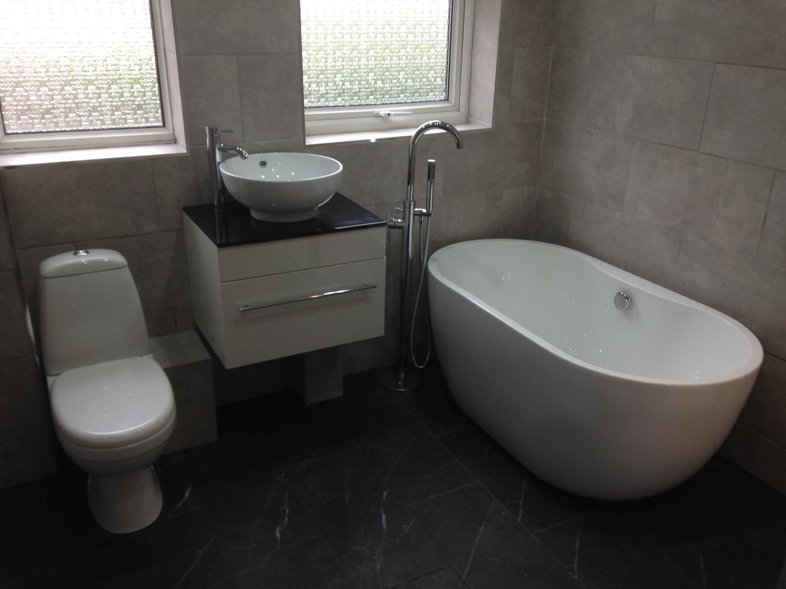 Bathroom with freestanding bath fitted by Inspiring Interiors